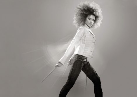 Drummer Cindy Blackman Santana wears a pair of custom-made Lost Art Suede Pants and a Lost Art Alligator Jacket with leather buttons