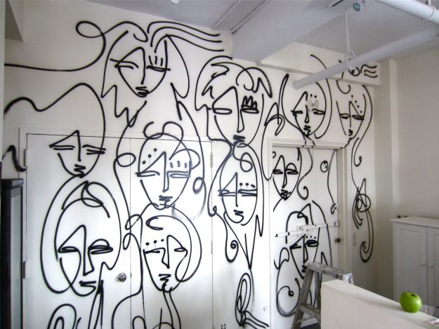 Faces - An Urban Art Mural by Jordan Betten, spray painted on the Interior Wall of a residence at 30th Street and 6th Avenue in New York City circa 2014