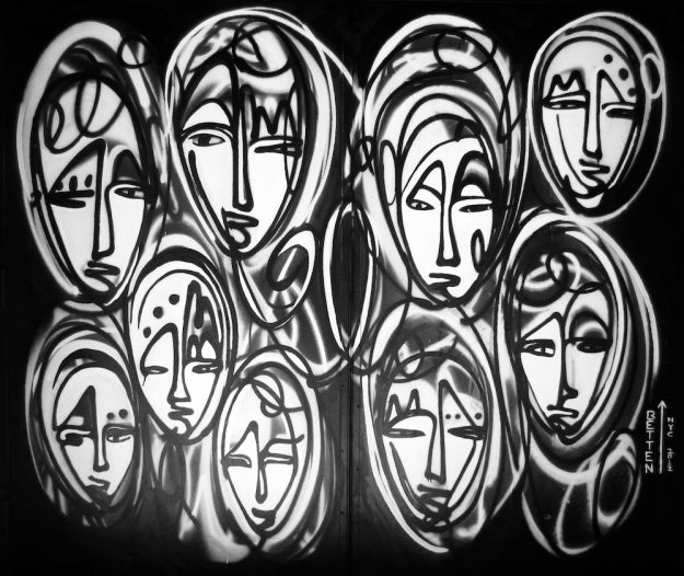 Faces of Sleep No More - Urban Art spray painted on the doors of The McKittrick Hotel by Jordan Betten and artist Sun Bae in New York City circa 2012