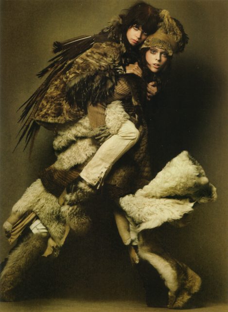 Female Model wears a custom-made Lost Art Fur Shawl with a Hood and Lost Art Leather Pants with Leather Laces in Vogue Italia Fall 2005