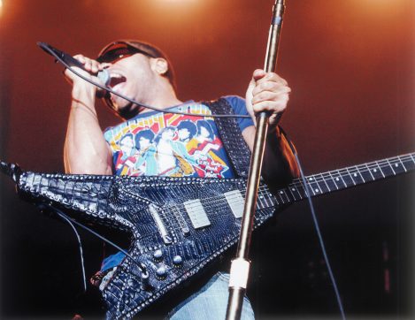 Lenny Kravitz plays a Gibson Flying V guitar that is covered with custom-made Lost Art™ Alligator cover