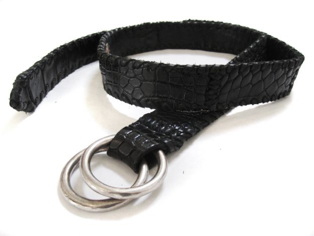 A Lost Art™ Black Crocodile skin belt with metallic silver rings and leather whip stitching