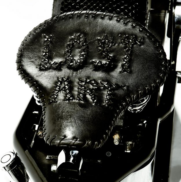 Lost Art™ hand-made Motorcycle Chopper leather seat with embroidered with leather laces spelling the words "Lost Art"