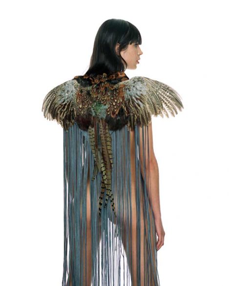 Model wears a hand-made Lost Art™ Pheasant Shawl with a Leather Fringe (worn by Musician Lenny Kravitz at the MTV awards)