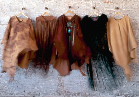 The Lost Art™ Poncho Collection - Custom Leather Ponchos that includes a Painted Suede Poncho, a woven Leather Fringe Shawl, a beaded with Turquoise Poncho and Suede Leather Poncho