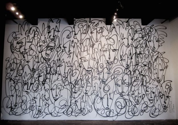 Marketplace Faces - An Urban Art Mural by Jordan Betten spray painted on the interior wall of The Marketplace Gallery in Albany New York circa 2012