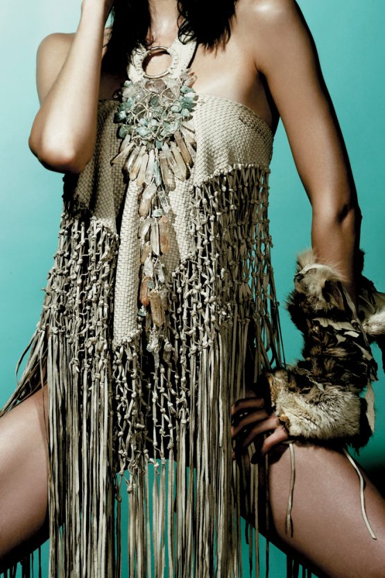 Model Elise Crombez wears handmade Lost Art™ clothing and accessories: a leather woven shawl with leather fringe, a crystal necklace made of quartz and aquamarine and adorns a fur armband