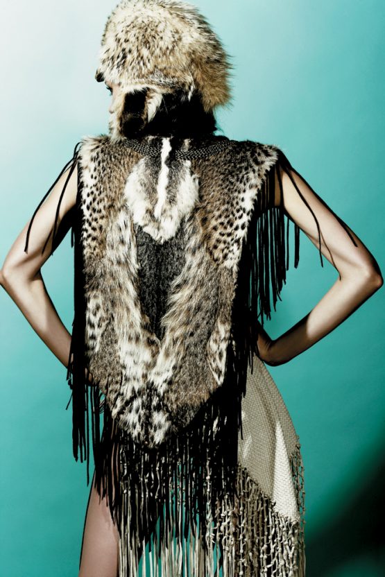 Model Elise Crombez wears hand-made Lost Art™ clothing and accessories: a Bobcat Fur Shawl with Leather Fringe and a Leather Woven Shawl