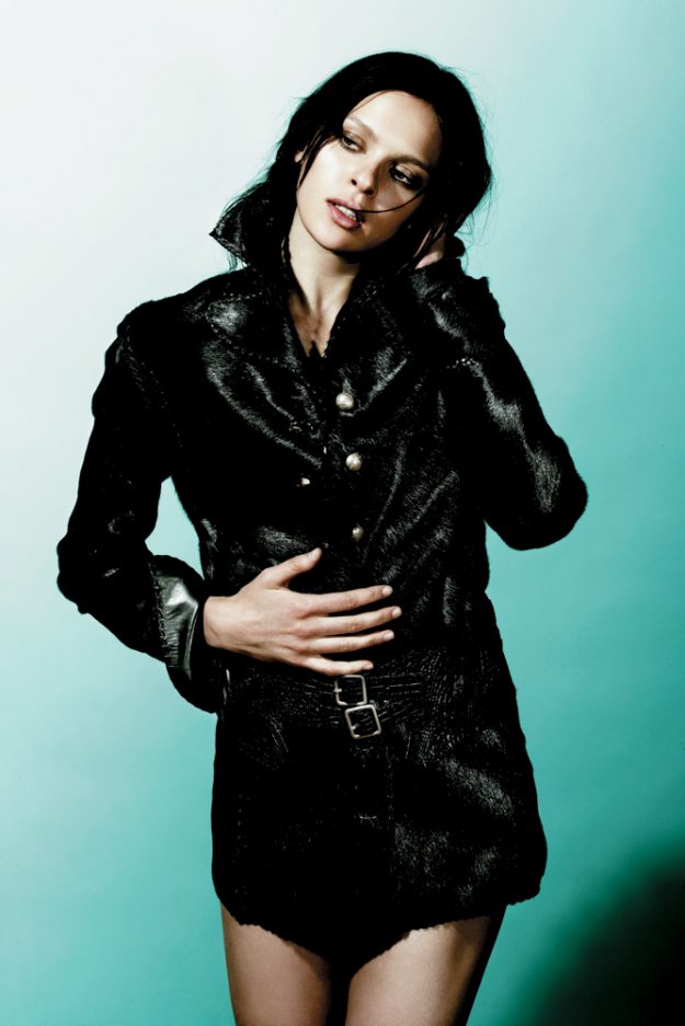Model Elise Crombez wears hand-made Lost Art™ clothing and accessories: a Calf Fur Jacket with Metallic Silver Buttons and a Python skin Belt with Double Metallic Silver Rings