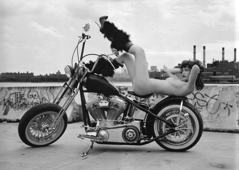 American actress and Model Paz de la Huerta laying naked on a chopper motorcycle, whose gas tank and seat are covered in custom-made Lost Art Snakeskin Leather in Purple Magazine.