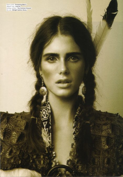 Model wearing a Lost Art Fur Shawl, Leather Skirt and Alligator Cape in Numéro Magazine 2003