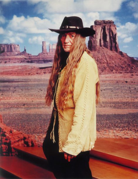 Musician Willie Nelson wearing a custom-made Lost Art Suede Jacket on the cover of his CD Album