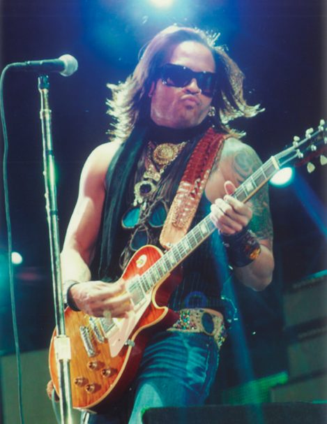 American singer-songwriter, multi-instrumentalist, record producer and actor Lenny Kravitz wearing Lost Art: guitar strap, crystal belt, leather accessories with crystals and fringe