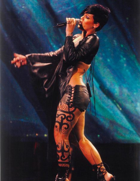American singer, songwriter, dancer and actress Pink performs at the MTV music awards 2003 wearing Lost Art Leather Shorts