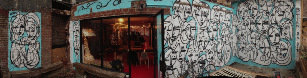 The Henley - An Urban Art Mural spray painted with paint and acrylic on the exterior wall of The Henley Vaporium in New York City by Jordan Betten and artist Sun Bae circa 2013