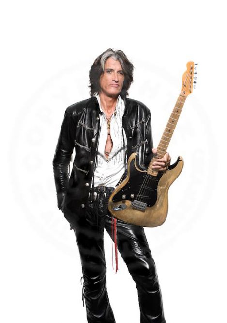 Guitarist Joe Perry of the Rock band Aerosmith wears Lost Art: Leather Jacket, Leather Pants and Belt with Silver Discs on the cover of Joe Perry's book - Rocks