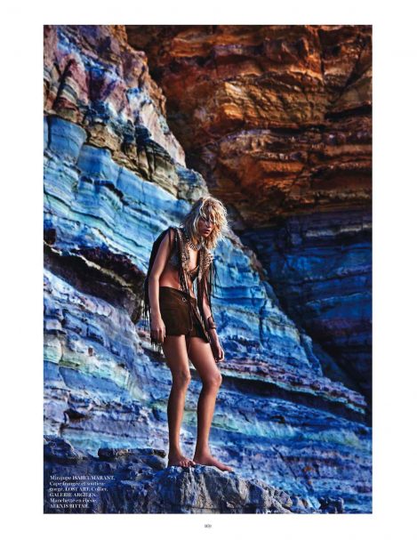 Model Anja Rubik wears a Lost Art Bobcat Fur Shawl with Metal Rings and Lost Art Suede Skirt in Vogue Paris Sauvage July 2013