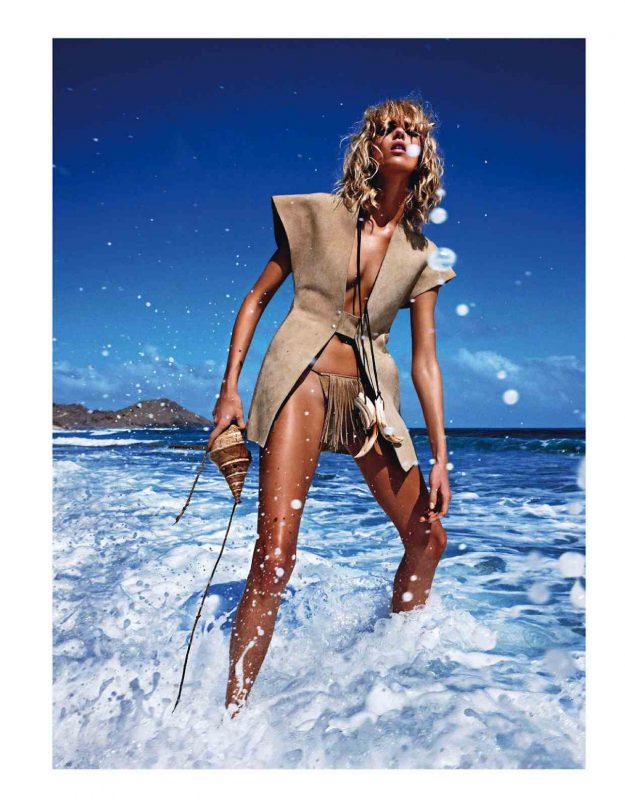 Model Anja Rubik wears a Lost Art Leather Bikini with Fringe and a Lost Art Bone Necklace in Vogue Paris Sauvage July 2013