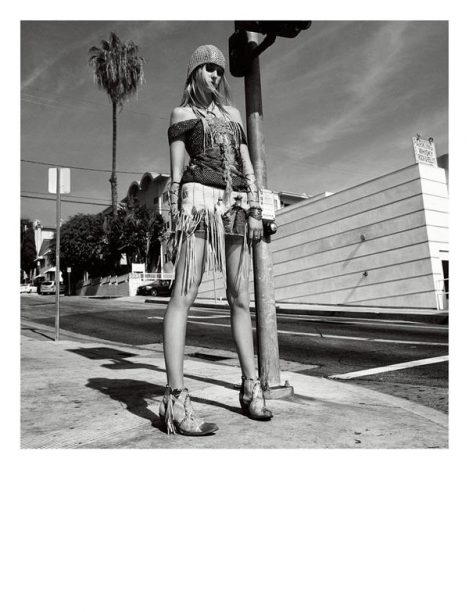 Model Sigrid Agren wears a Lost Art Woven Leather Hat, Lost Art Crystal Necklace with Metal Rings and Lost Art Fur Belt with Crystals and Leather Fringe in Numero Magazine April 2014