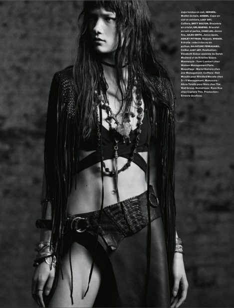 Model Yumi Lambert wears a Lost Art leather belt & skirt in Numero Magazine