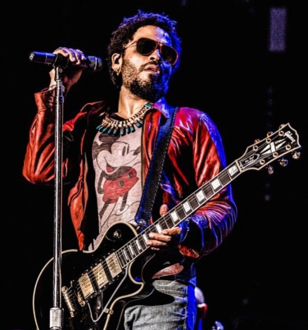 Singer songwriter Lenny Kravitz with a Lost Art python guitar strap custom-made by Jordan Betten
